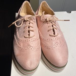 Lightweight pink loafers with rubber soles..size 8.5-9